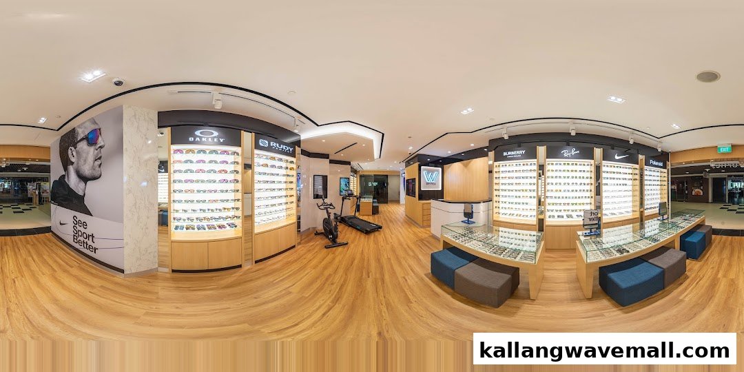 A wide-angle view of W Optics interior, showcasing extensive eyewear displays, a reception desk, and a sports vision testing area.