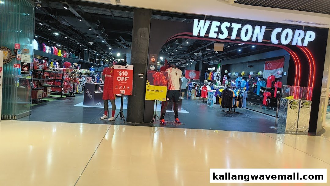 The entrance of Weston Corp, a sports retail store, showcasing apparel and equipment with promotional displays.