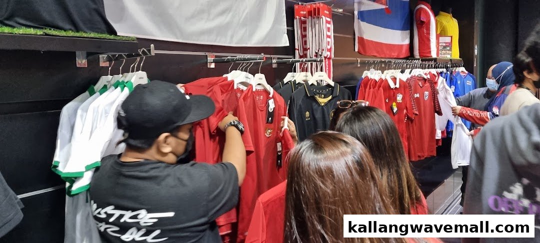 Customers browse a wide selection of sports jerseys and apparel inside Weston Corp.