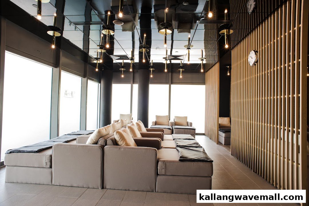 A modern and serene relaxation lounge with comfortable seating, large windows, and stylish lighting.