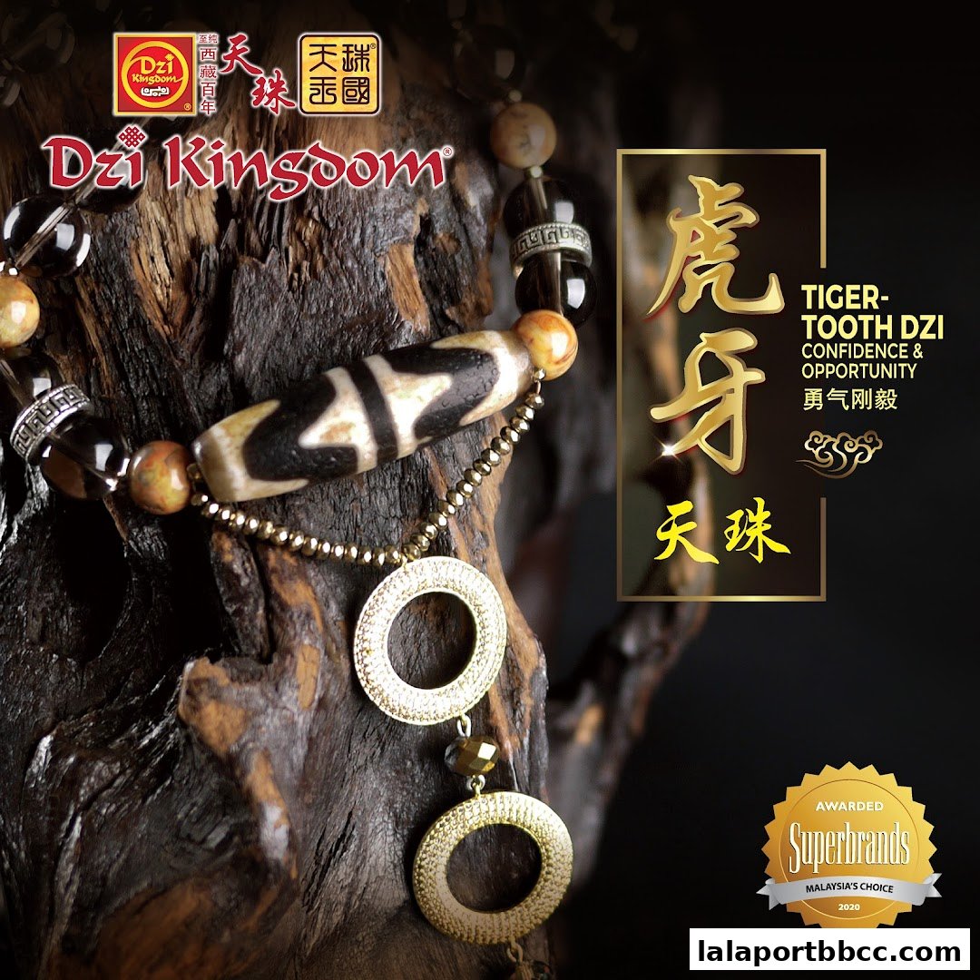 A close-up of a Dzi bead bracelet with gold accents, promoting confidence and opportunity.