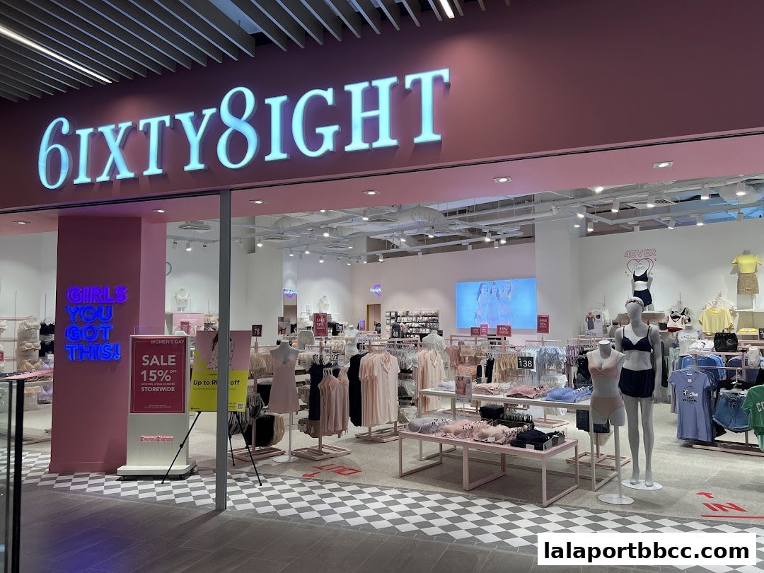 The brightly lit storefront of 6IXTY8IGHT, showcasing lingerie and apparel on mannequins and racks.