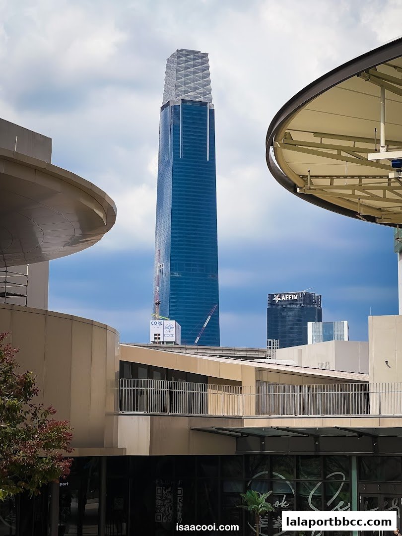 Modern architecture with a tall skyscraper in the background.