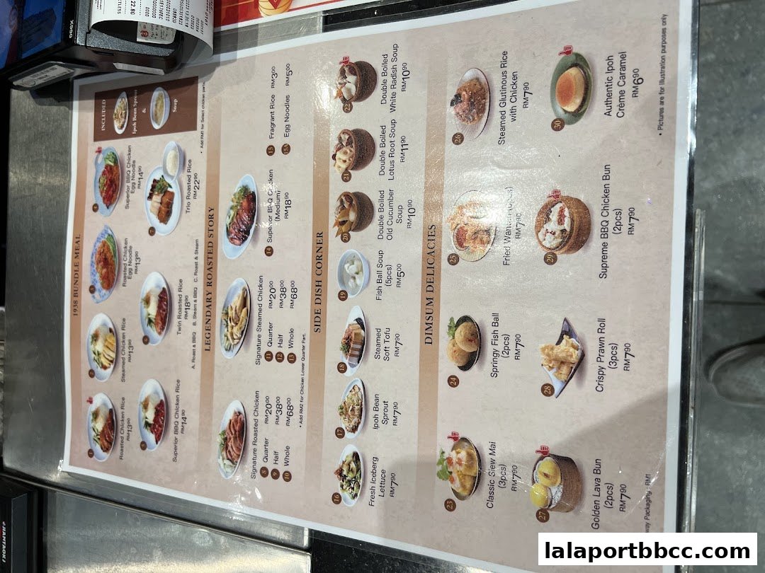 A menu from Nam Heong Chicken Rice featuring various chicken dishes, dim sum, and side dishes.