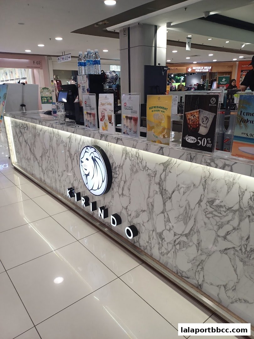 The Kirindo shop front with a marble counter, logo, and drink displays.