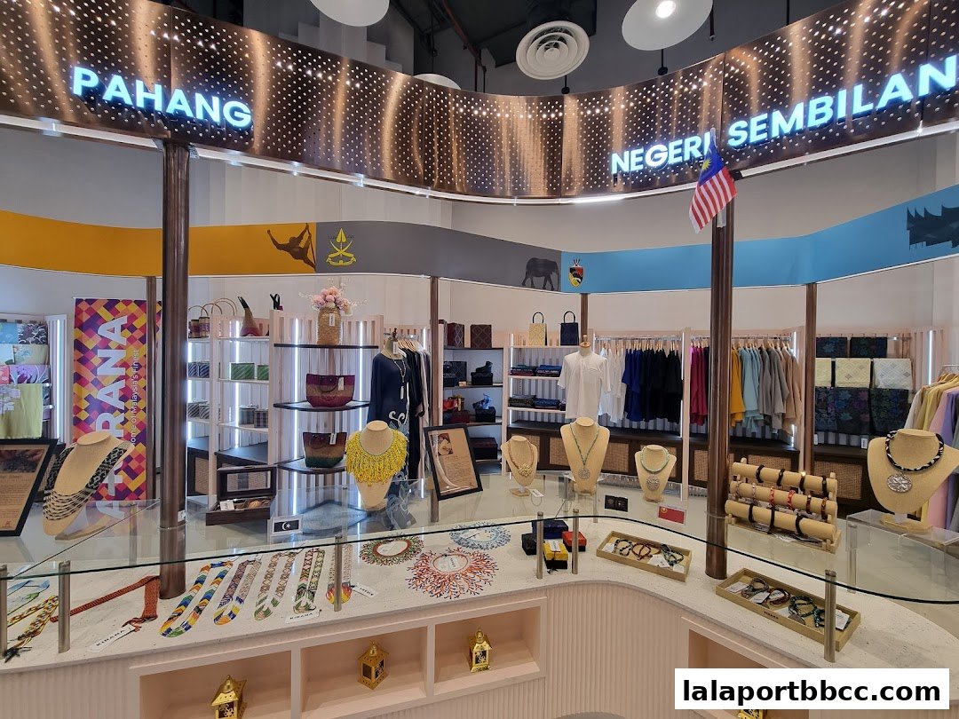A retail store interior showcasing Malaysian crafts, clothing, and accessories.