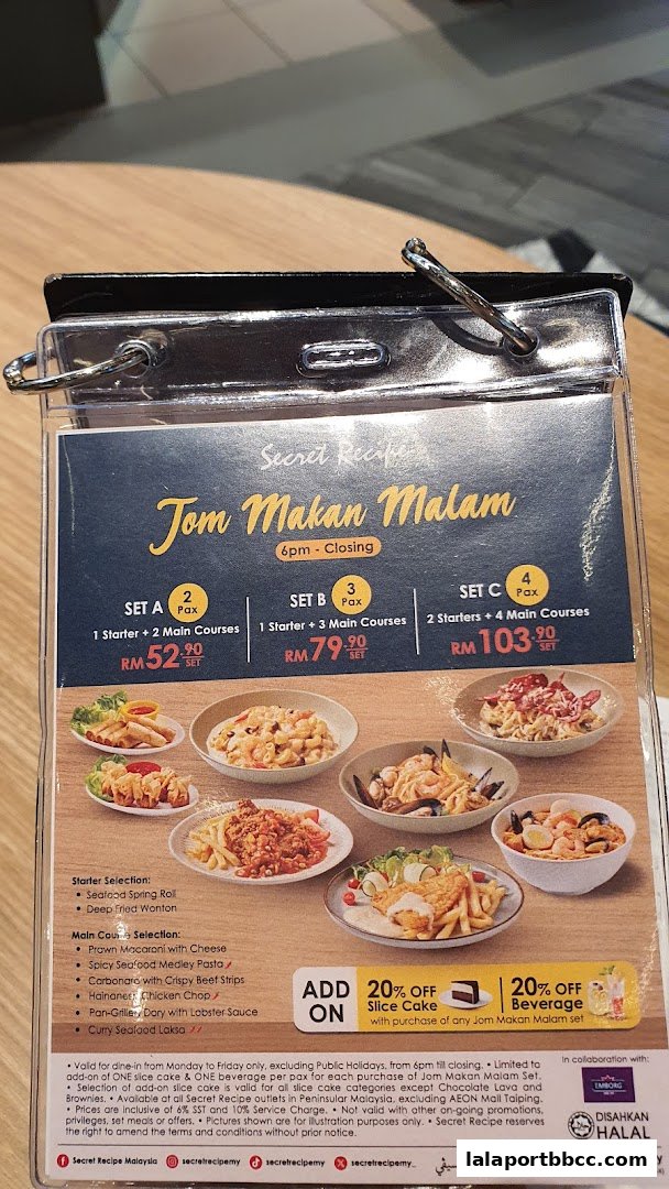 A menu from Secret Recipe showcasing their 'Jom Makan Malam' set meals with various starter and main course options.