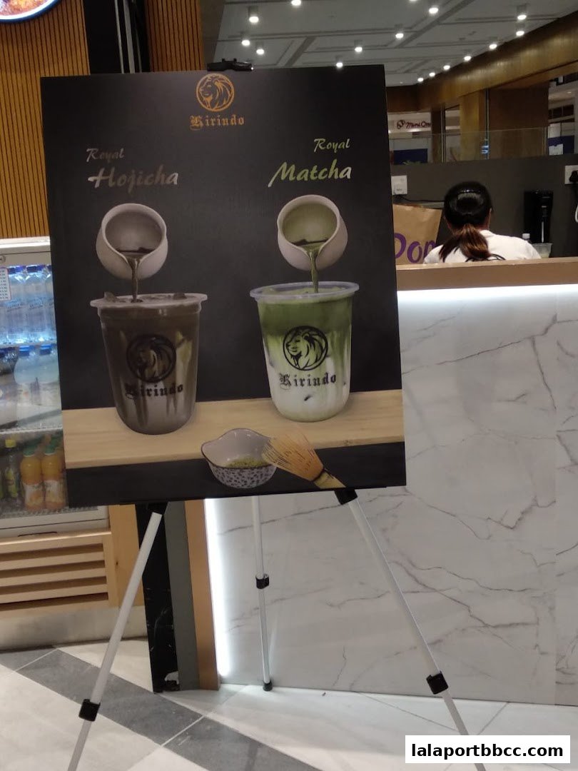 A display board showcasing Kirindo's Royal Hojicha and Royal Matcha drinks.