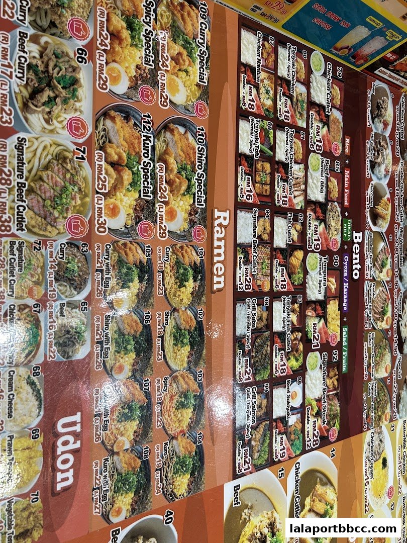 A colorful menu displaying various Japanese curry, udon, and bento dishes with prices.