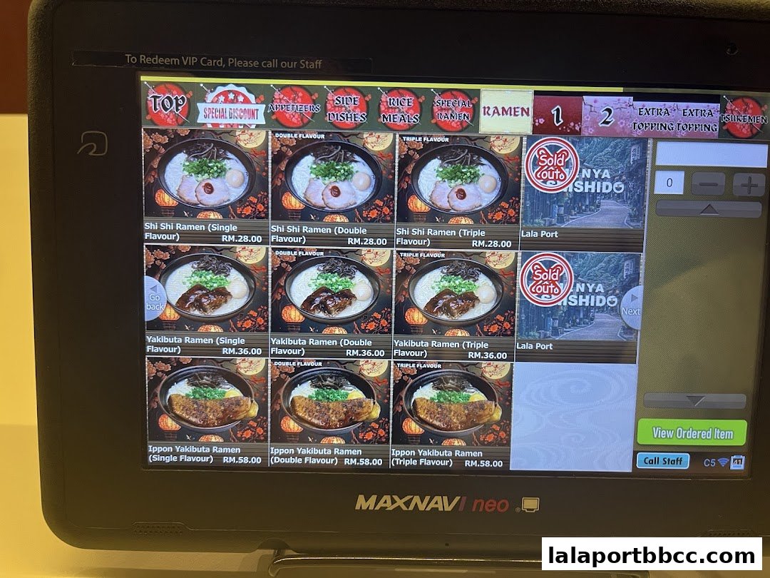 A digital menu displaying various ramen dishes with prices and images.