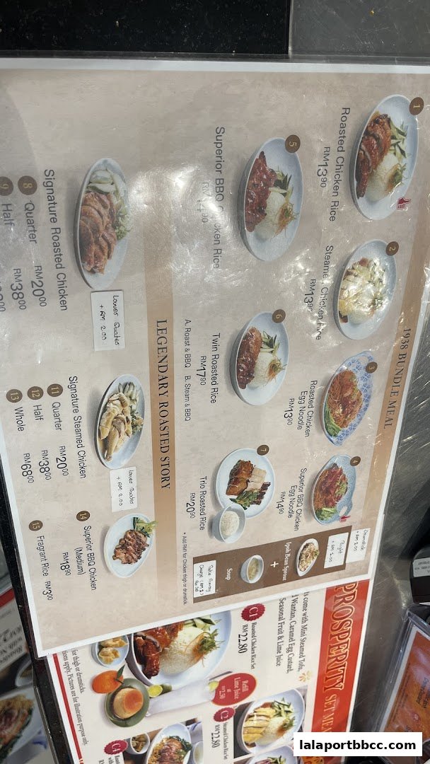 A menu from Nam Heong Chicken Rice featuring various roasted and steamed chicken dishes and set meals.