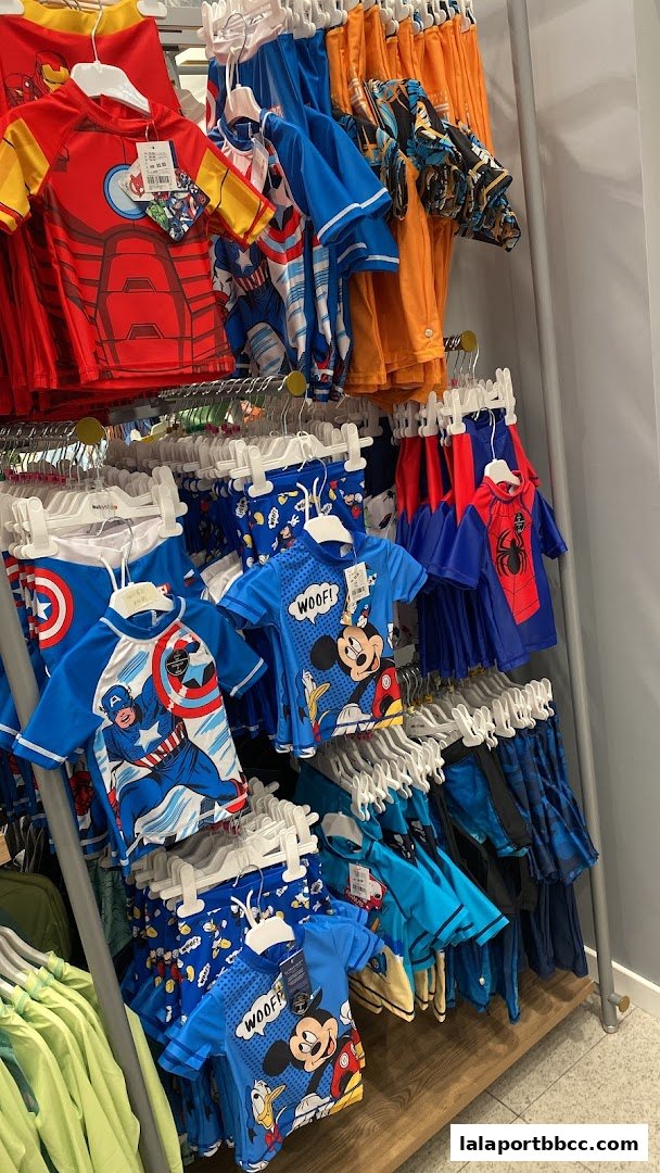 A display of children's swimwear featuring popular Marvel and Disney characters.