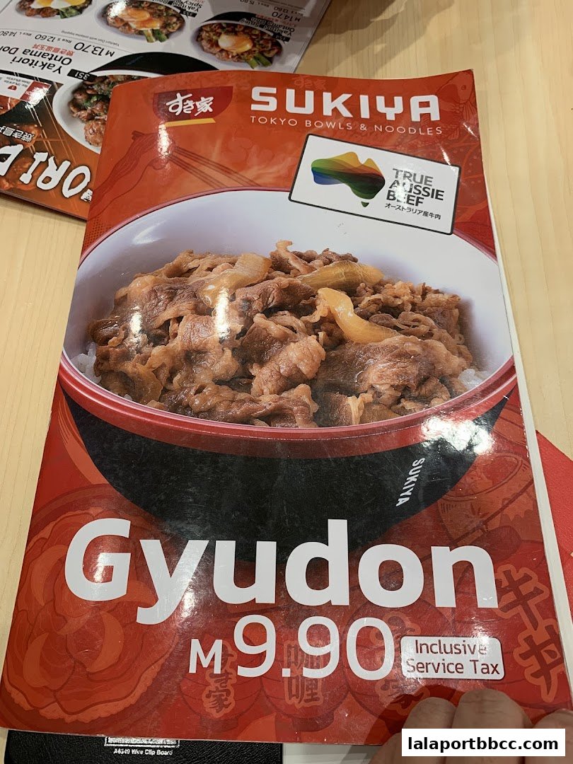 A menu featuring Sukiya's Gyudon dish with beef and rice, priced at M9.90.