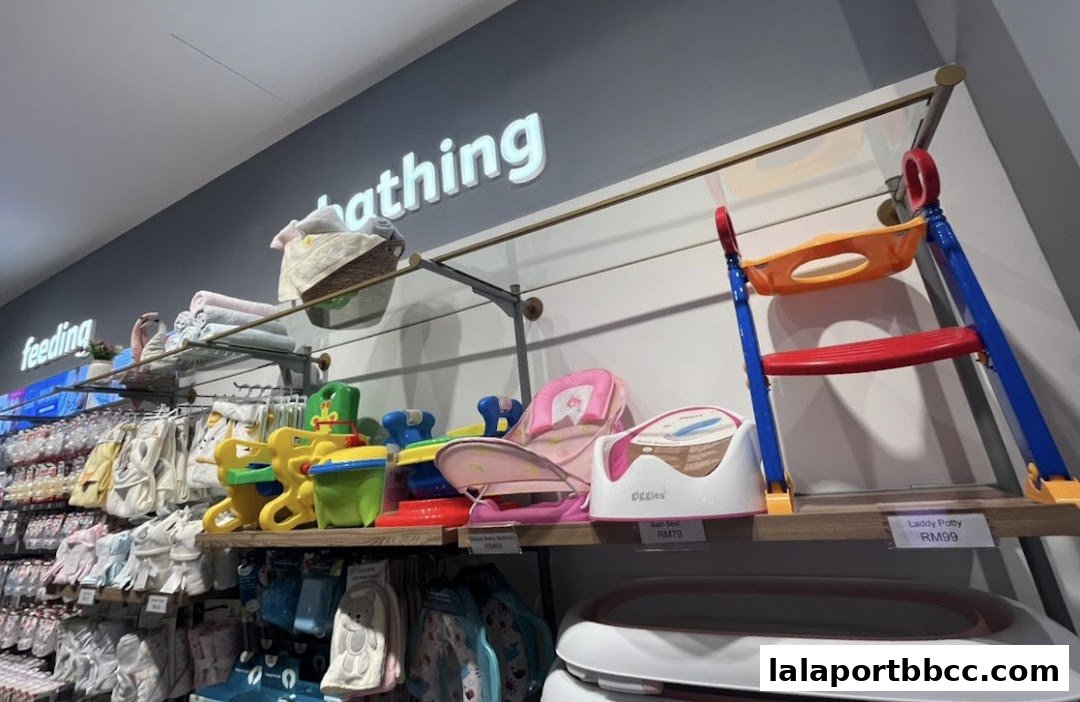 A well-organized display of baby bathing and feeding products, including toys and accessories.
