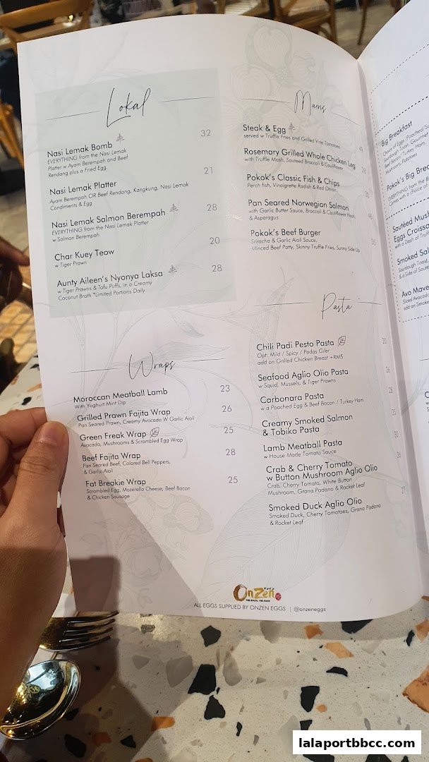A menu from POKOK LaLaport featuring categories like Lokal, Mains, Wraps, and Pasta.