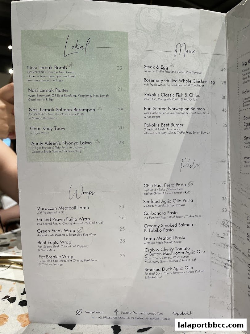 A menu from POKOK LaLaport featuring categories like Lokal, Mains, Wraps, and Pasta.