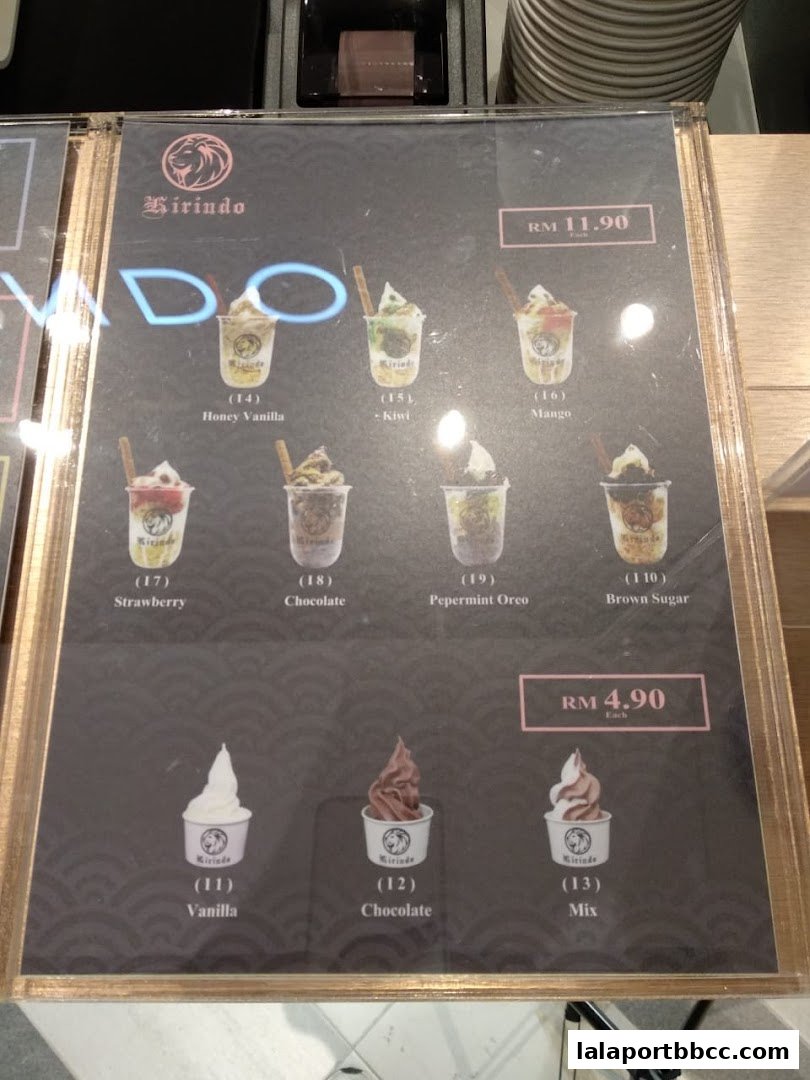 A menu board displaying various soft-serve ice cream flavors from Kirindo.