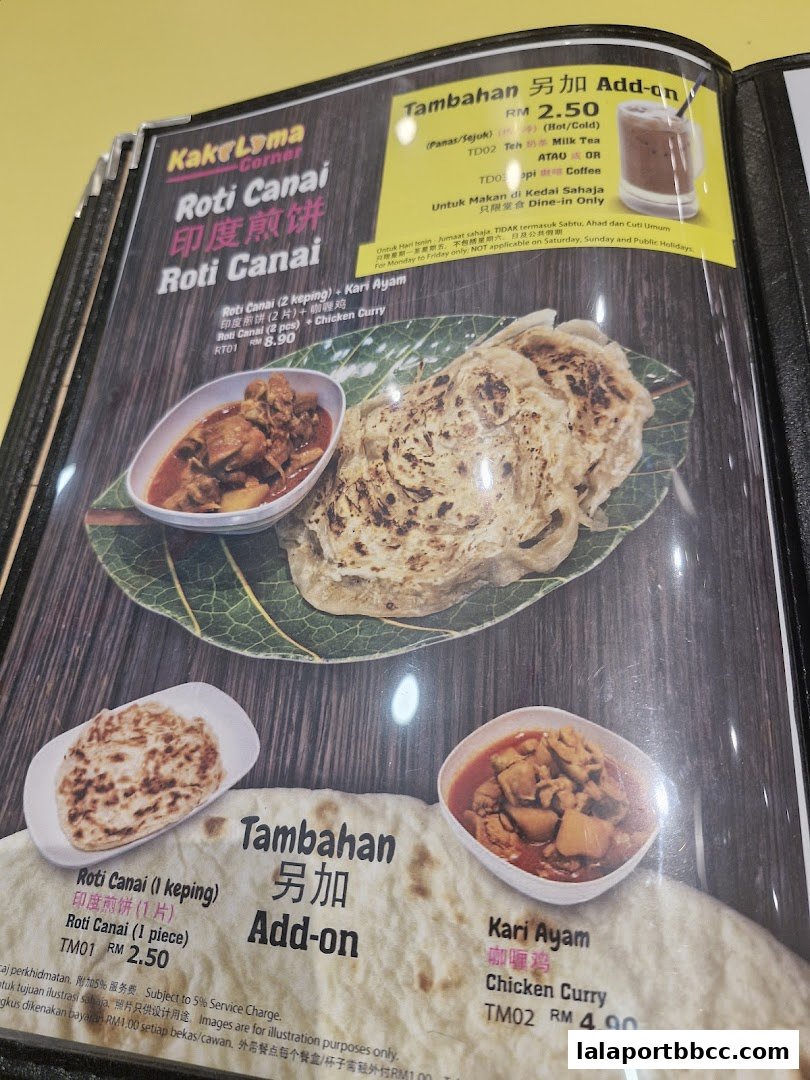A menu page from Kaki Lima Corner featuring Roti Canai and Chicken Curry.
