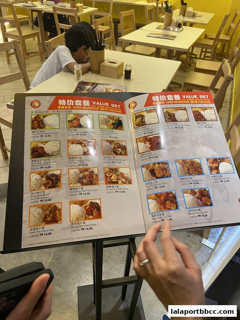 A menu from Sai Kee Restaurant featuring value sets with various dishes and rice.