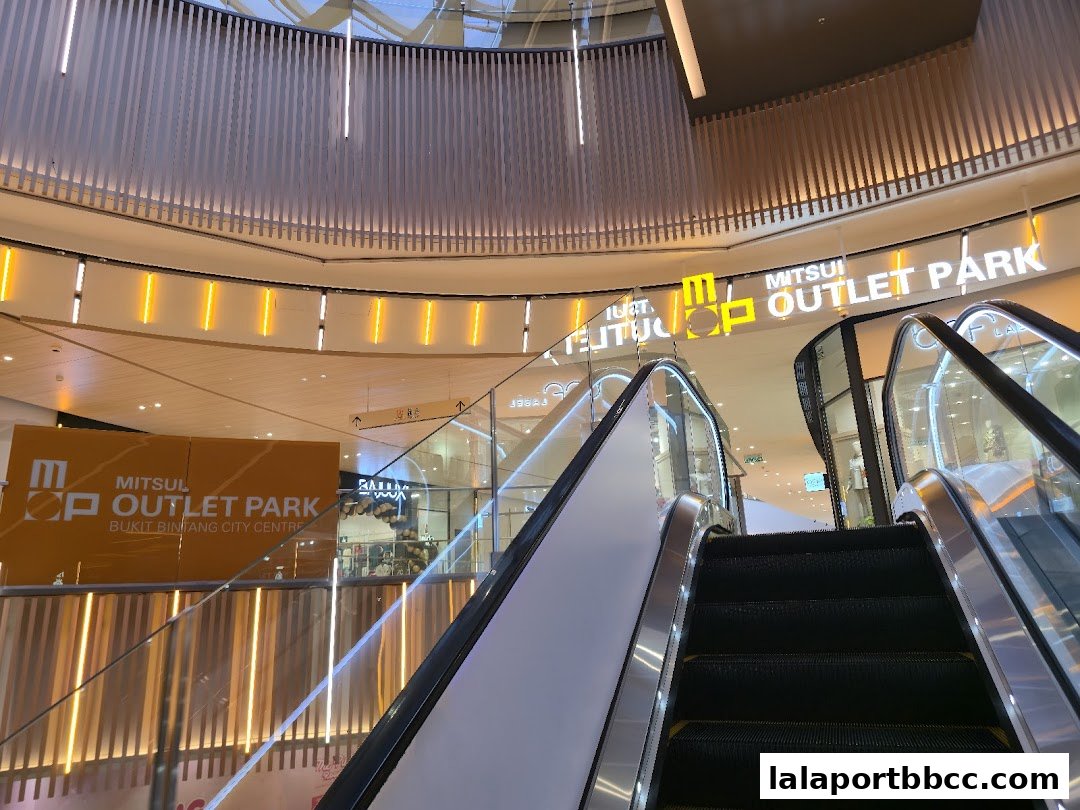 Escalators leading up to the Mitsui Outlet Park Bukit Bintang City Centre signage.
