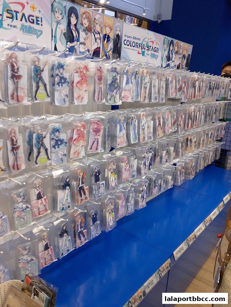 A wall display filled with anime character acrylic stands from Project SEKAI Colorful Stage!