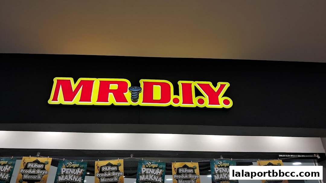 The MR.DIY store sign with promotional banners hanging below.