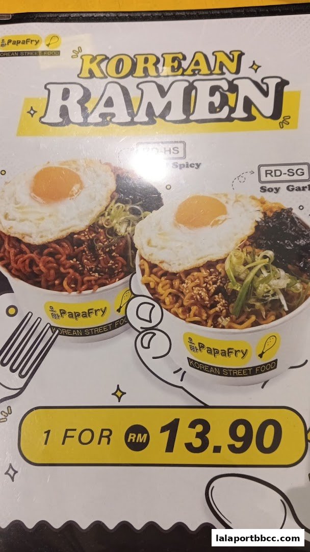 A menu item showcasing Korean Ramen with a fried egg and seaweed from PapaFry.