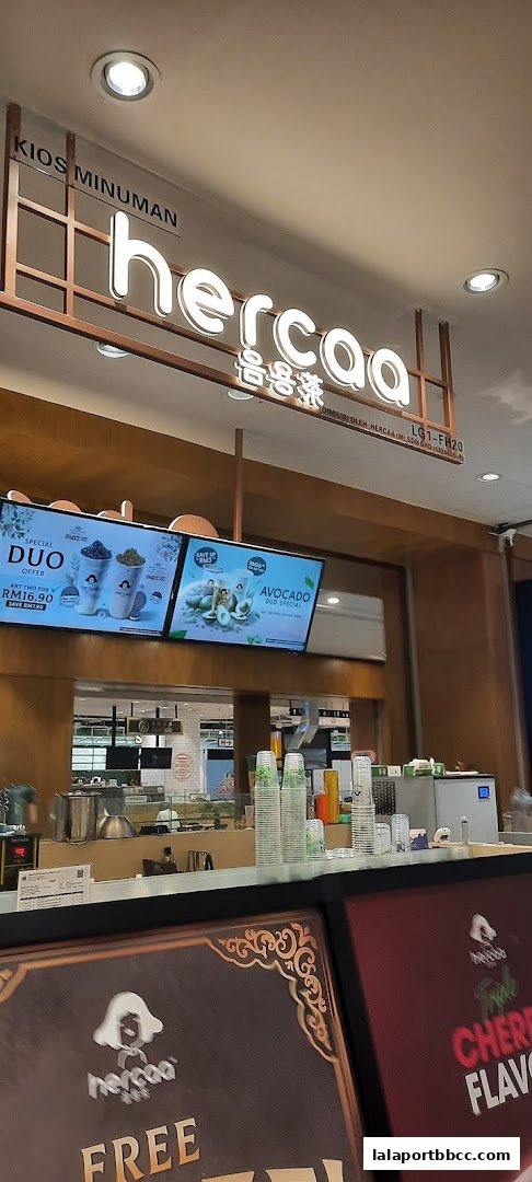 The front of a beverage kiosk named Hercaa, displaying menu specials.