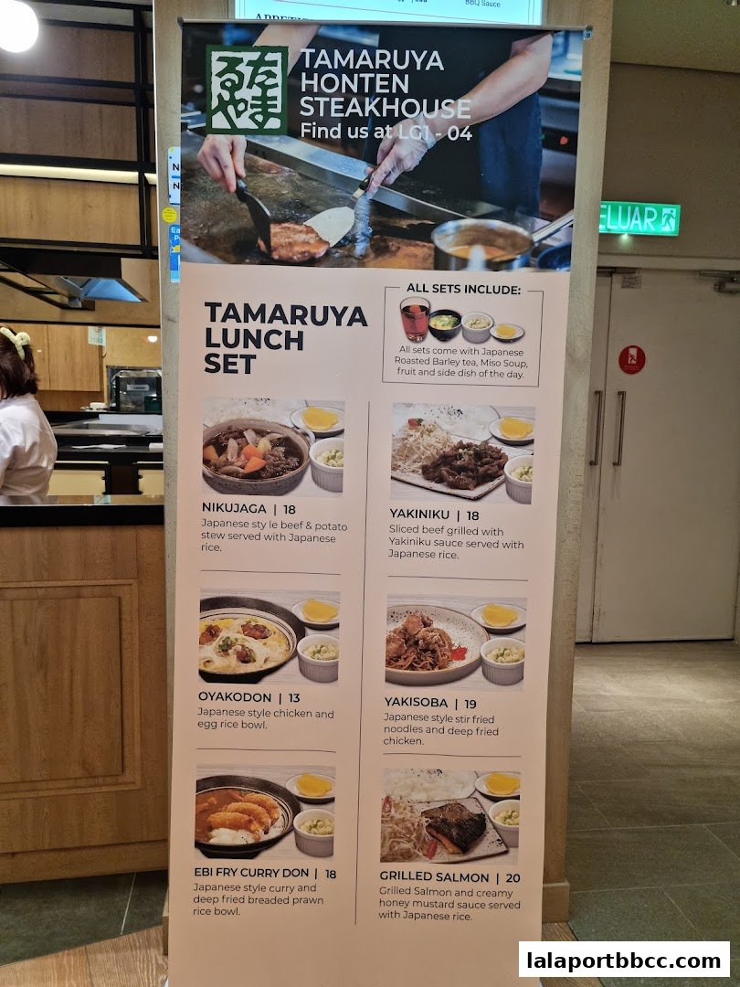 A promotional banner for Tamaruya Honten Steakhouse's lunch sets.
