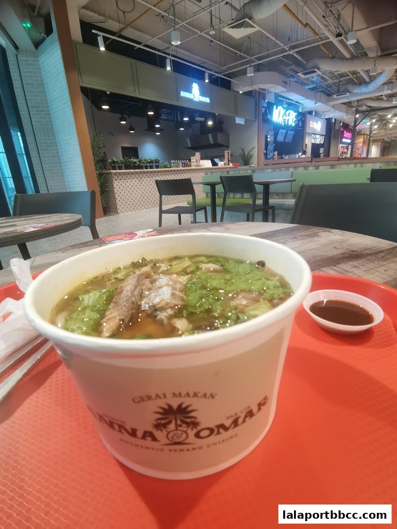 A bowl of soup with meat and vegetables on a tray at Auntie Anna Pak Cik Omar.