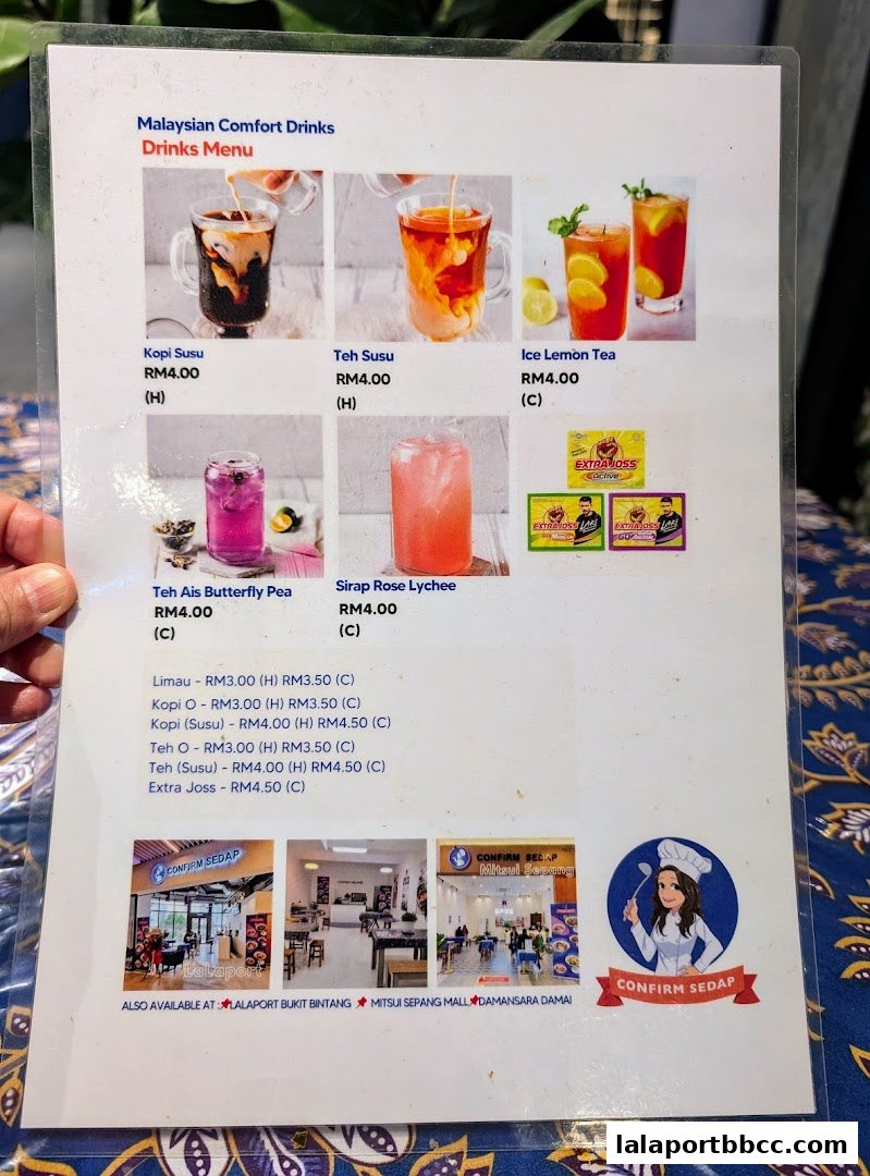 A menu featuring Malaysian comfort drinks with images and prices.