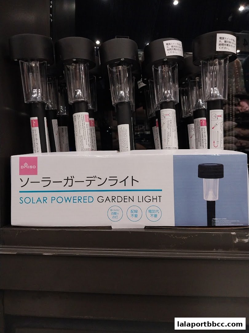 Daiso solar-powered garden lights displayed on a shelf.