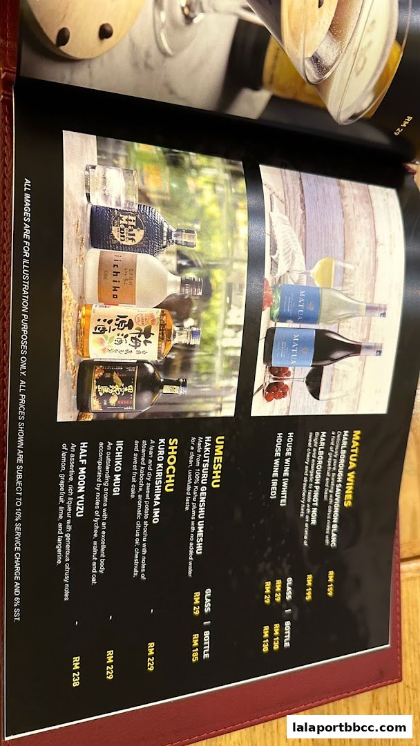 A menu page showcasing various wines and spirits with descriptions and prices.