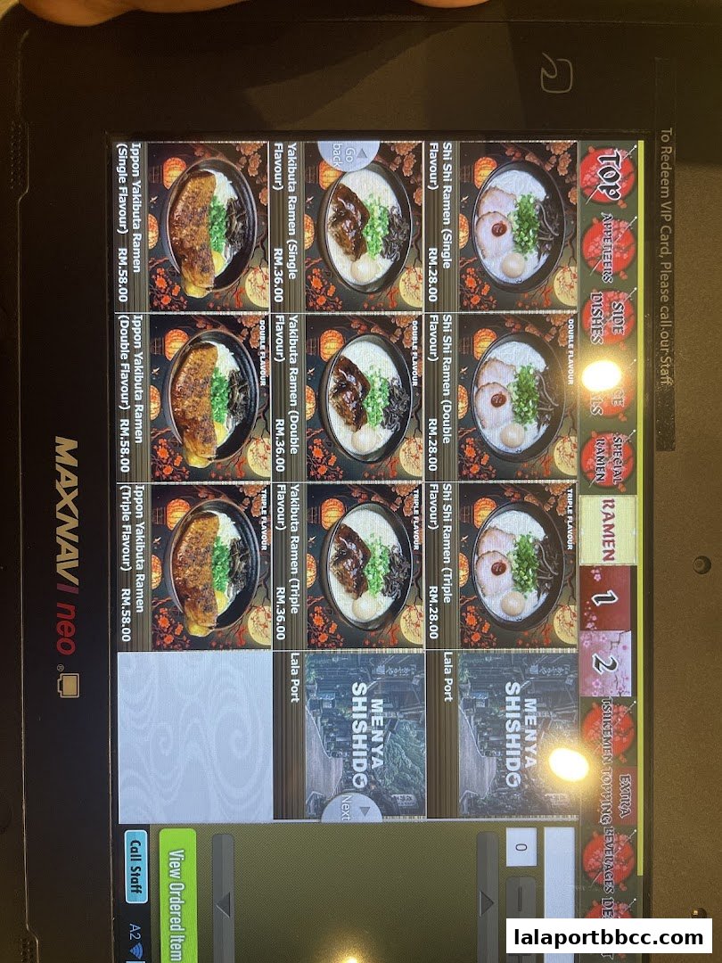A digital menu displaying various ramen dishes with prices and images.