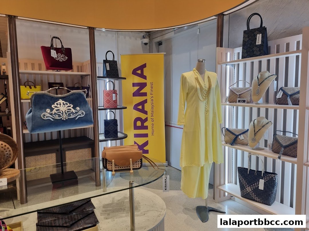 A display of Malaysian fashion and accessories, including handbags, clothing, and jewelry.