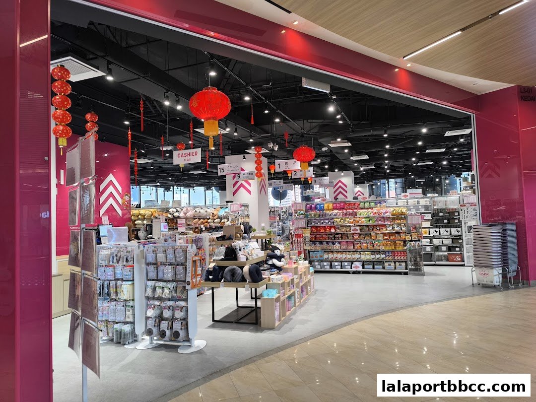 Interior view of a Daiso store with shelves stocked with various products and festive lanterns.