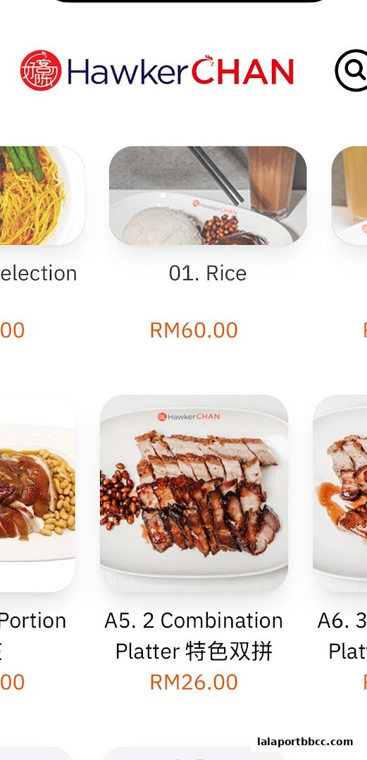 A display of Hawker Chan's popular rice and platter dishes with prices.