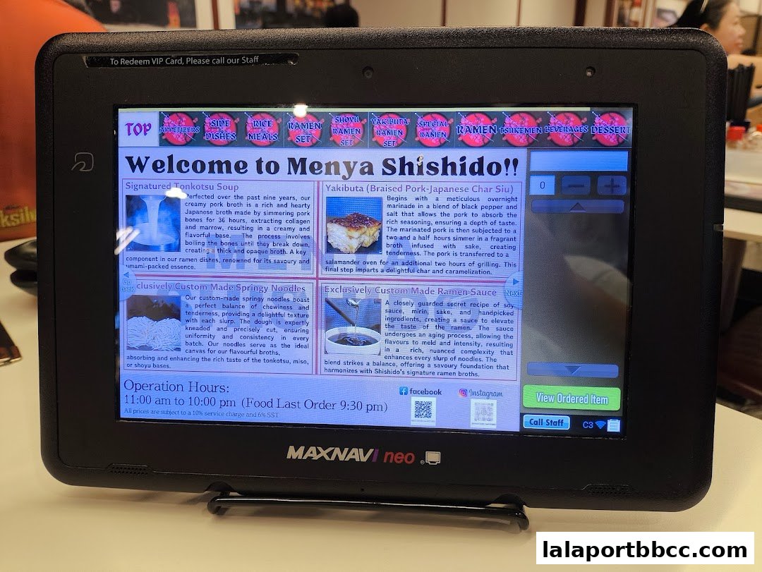 A digital menu screen displaying information about ramen dishes and noodles at Menya Shishido.