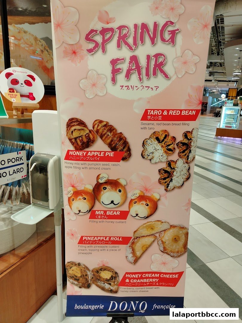 A promotional banner for DONQ boulangerie's Spring Fair featuring various pastries.
