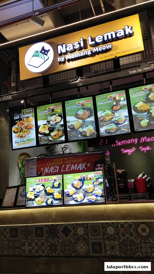 A brightly lit display of Nasi Lemak meals and combos offered at the shop.