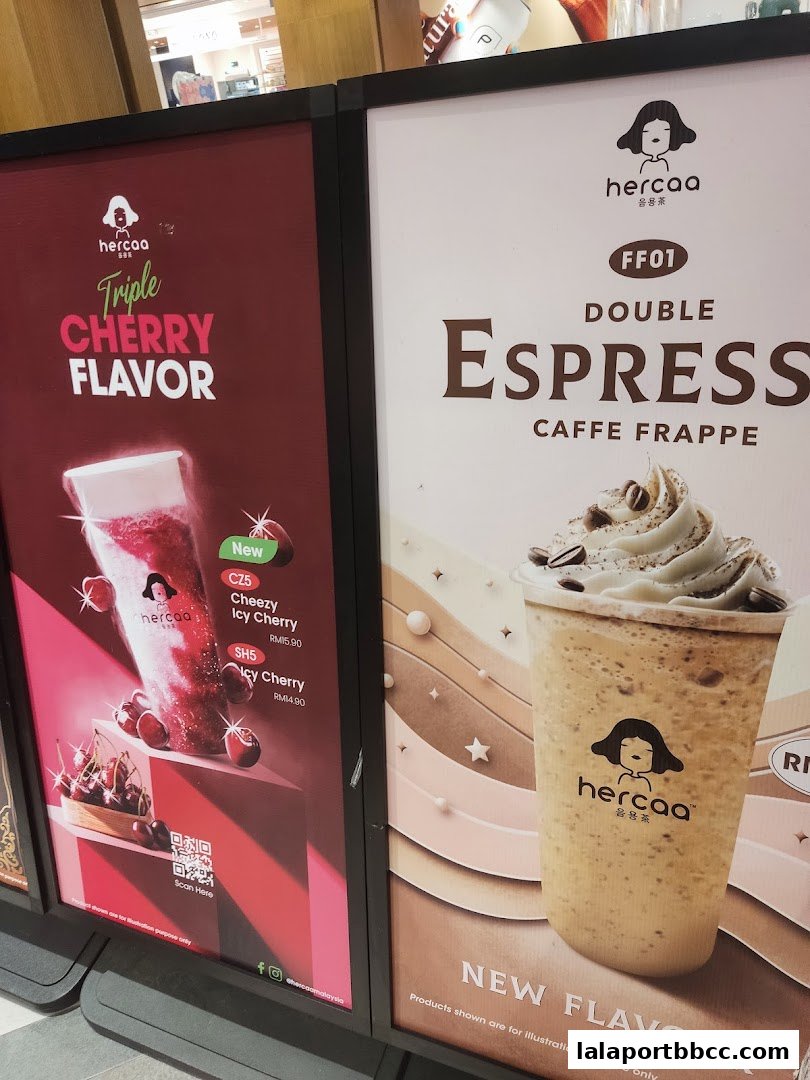 Advertisements for Hercaa drinks, featuring Triple Cherry Flavor and Double Espresso Caffe Frappe.