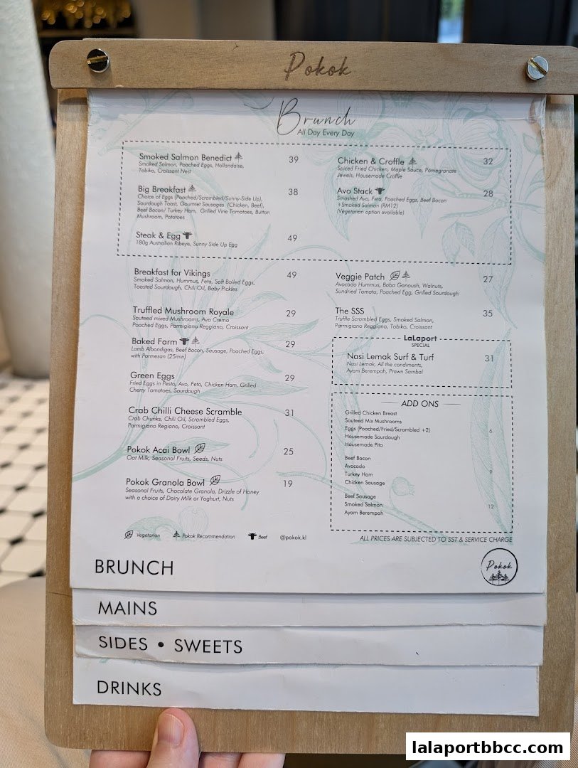 A menu for 'Pokok' restaurant featuring brunch items, mains, sides, sweets, and drinks.