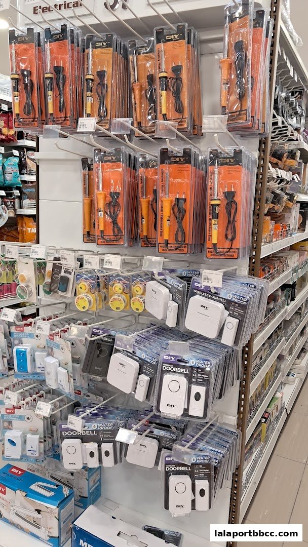 Shelves stocked with various DIY electrical tools and wireless doorbells.