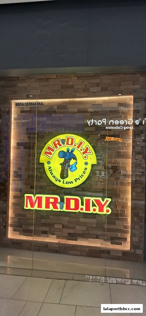 The MR.DIY shop front with its iconic logo and signage.