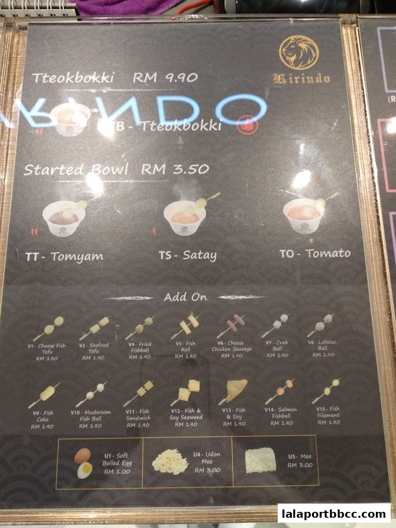 A menu for Kirindo featuring Tteokbokki, Started Bowls, and various add-on skewers and noodles.