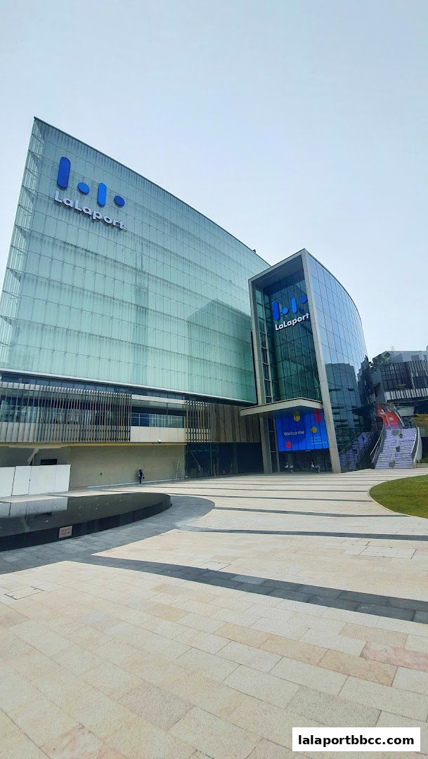 The modern LaLaport BBCC building with its distinctive glass facade and prominent signage.