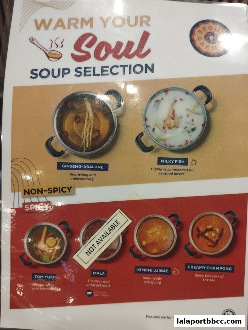 A menu showcasing various soup selections from Seoul Garden, including Ginseng-Abalone, Milky Fish, Tom Yum, Mala, Kimchi Jjigae, and Creamy Champong.