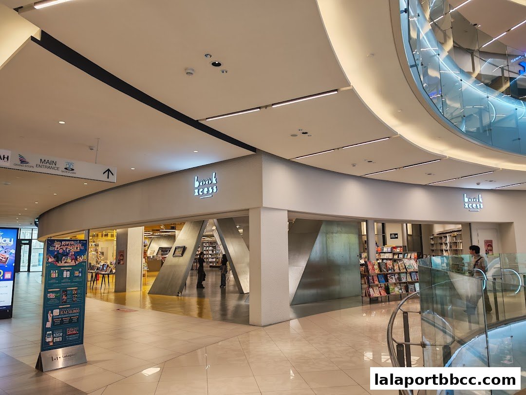 The entrance and interior of a BookXcess bookstore in a modern shopping mall.