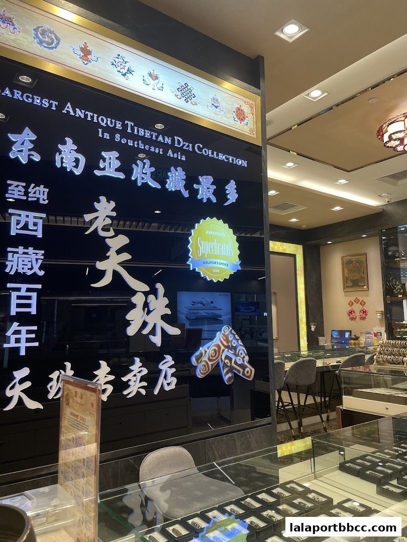 Shop front of Dzi Kingdom, featuring Tibetan Dzi bead collection and awards.