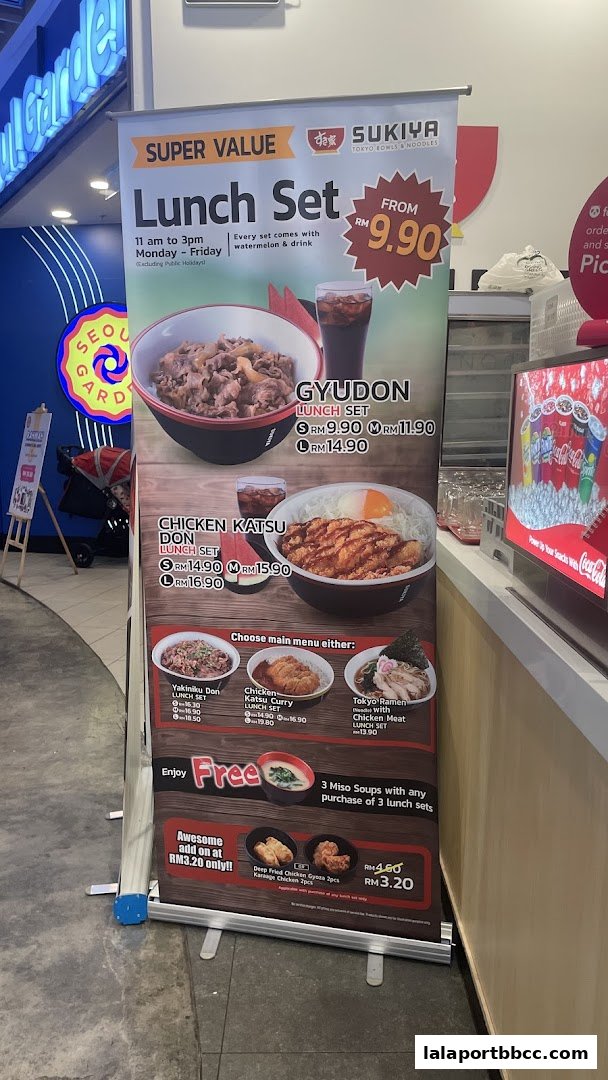 A promotional banner for Sukiya's Lunch Sets, featuring Gyudon and Chicken Katsu Don.